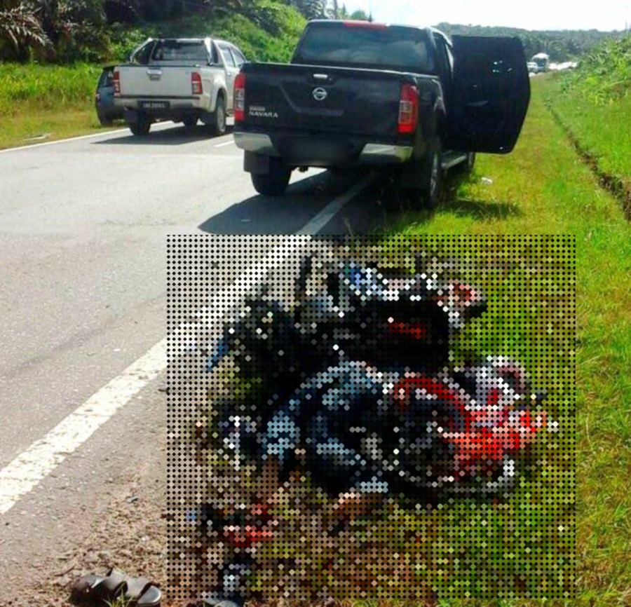 Two people were killed when their motorcycle collided with a four-wheel-drive (4WD) vehicle along Jalan Beluran-Telupid near Sandakan. NSTP PIC by HAZSYAH ABDUL RAHMAN.