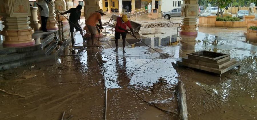 “The temple's mini peacock chariot was swept away by floodwaters for about 1km. Swift currents resulted in broken wooden doors and pushed debris into the temple compound, while the temple was covered by thick mud sludge.” Pic courtesy of NSTP reader.