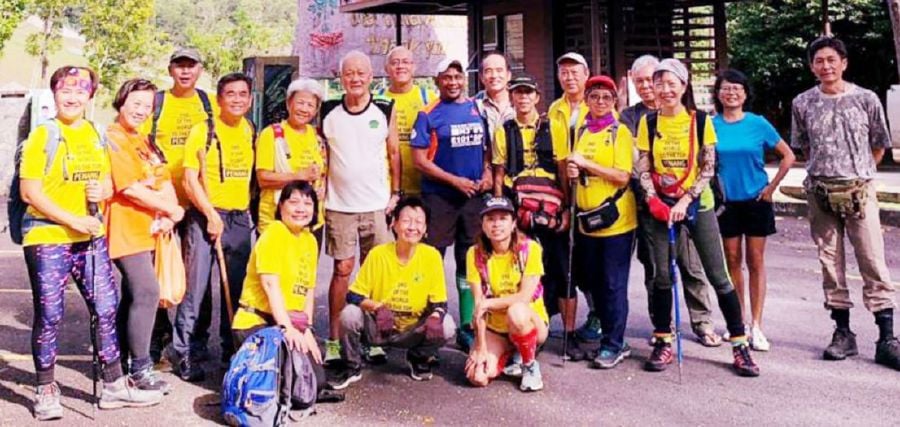 Brig-Gen (Rtd) Datuk Soon Lian Cheng (standing, sixth from left) with the ‘Evergreen Hash Walkers’ who trekked across Penang island, from the ‘End of the World’ Rimba Teluk Bahang forest reserve to Bats Cave temple at the foothill of Bukit Bendera (Penang Hill). 