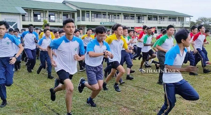Students join their teachers for the '16th Annual Run' at St Andrew’s School Muar in Johor. - NSTP/ADRIAN DAVID