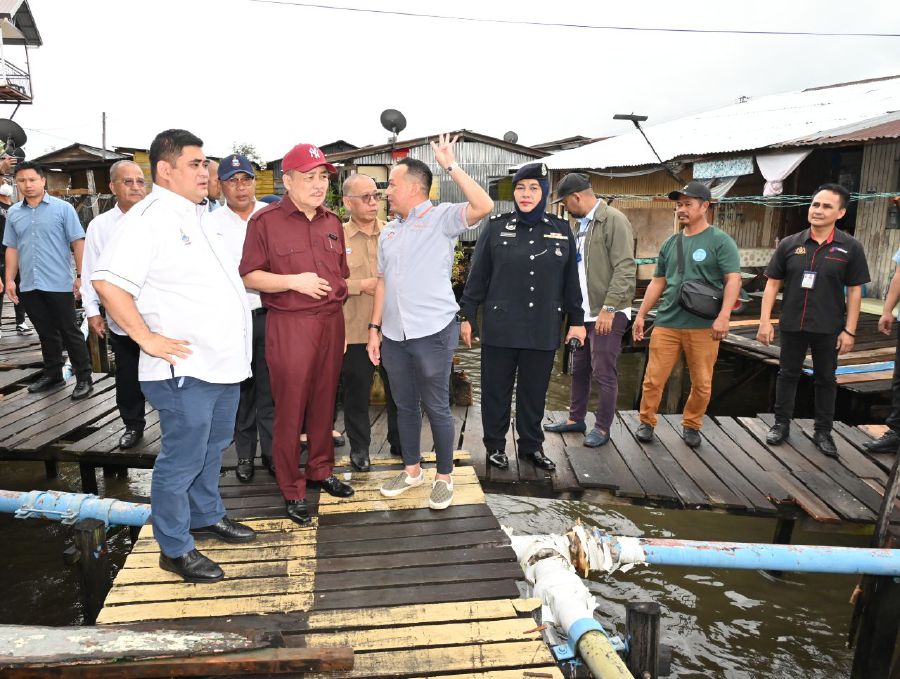 State Chief Minister Datuk Seri Hajiji Noor said three of the families, whose homes were completely destroyed, would receive an additional RM20,000 each to rebuild their houses. - Pic courtesy of Sabah Chief Minister’s office 