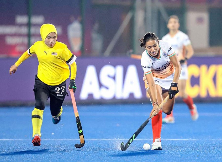 Malaysia (in yellow) in action against hosts India in a women's Asian Champions Trophy match at the Marang Gomke Jaipal Singh Stadium in Ranchi on Saturday. - Pic credit AHF 