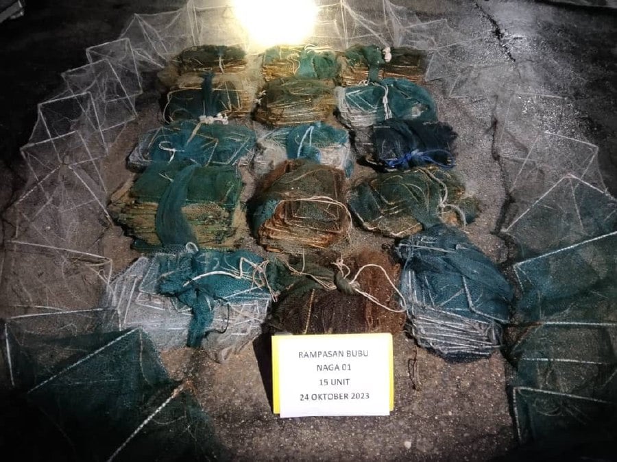 Kuala Kedah Maritime Zone director Maritime Commander Noor Azreyanti Ishak said that in the latest seizures, the agency seized 208 units of the dragon trap nets in five separate locations between Yan and Kuala Kerpan in two weeks. - Pic courtesy of MMEA 