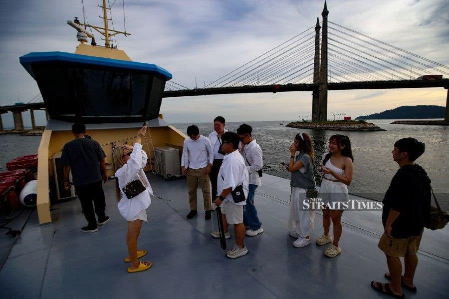 The Penang Bridge Sunset Cruise is not only a leisurely pursuit but also poised to significantly contribute to the growth of Penang’s tourism sector.- NSTP/Mikail Ong