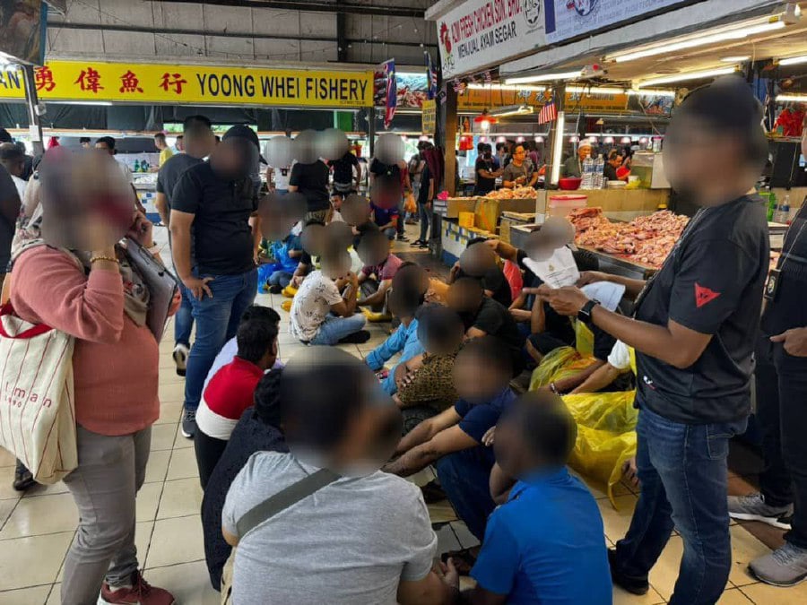 The arrests were made because all of them failed to produce any valid travel documents, and were suspected of overstaying, abusing the Social Visit Pass in addition to violating the conditions of the pass. - Pic credit JIM JOHOR