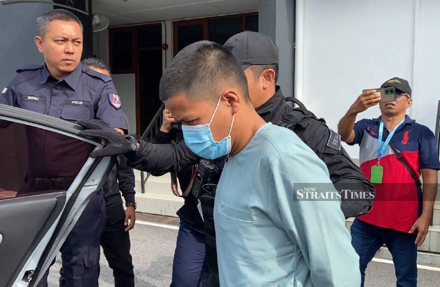 The shouts of ‘murderer, murderer’ were heard as Mohammad Haikal Mahfuz, the boyfriend of Bella, was escorted out of the Magistrate Court here after being charged with the murder of the young woman. - NSTP/ Alias Abd Rani
