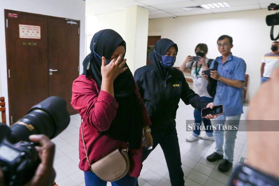 Jasmizatul Syuhada Jamaluddin, 34, claimed trial to all the charges which were read to her by the court interpreter before Sessions Court Judge Zulhazmi Abdullah. - NSTP/DANIAL SAAD