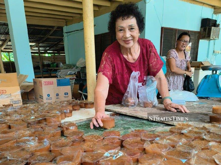 Lee Le Kim said she has been making Nian Gao for more than 20 years at her home in Jalan Chin Hwa, here. - NSTP/Sharifah Mahsinah Abdullah