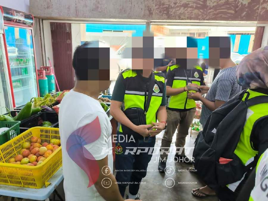 Eight undocumented foreign men were detained in Ops Bersama for working without permits and overstaying.- Pictures Courtesy of Johor Immigration Department.