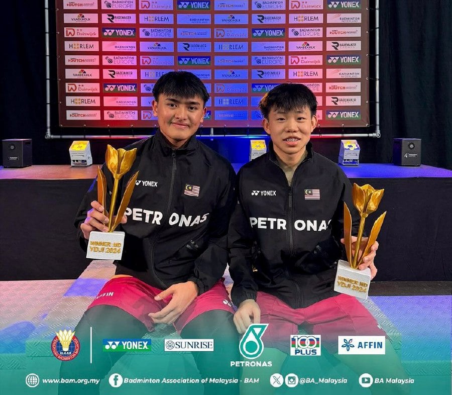 Aaron Tai (right) and Kang Khai Xing with the trophies after winning the boys' doubles at the Dutch Junior International in Haarlem on Sunday. - Pic credit BAM