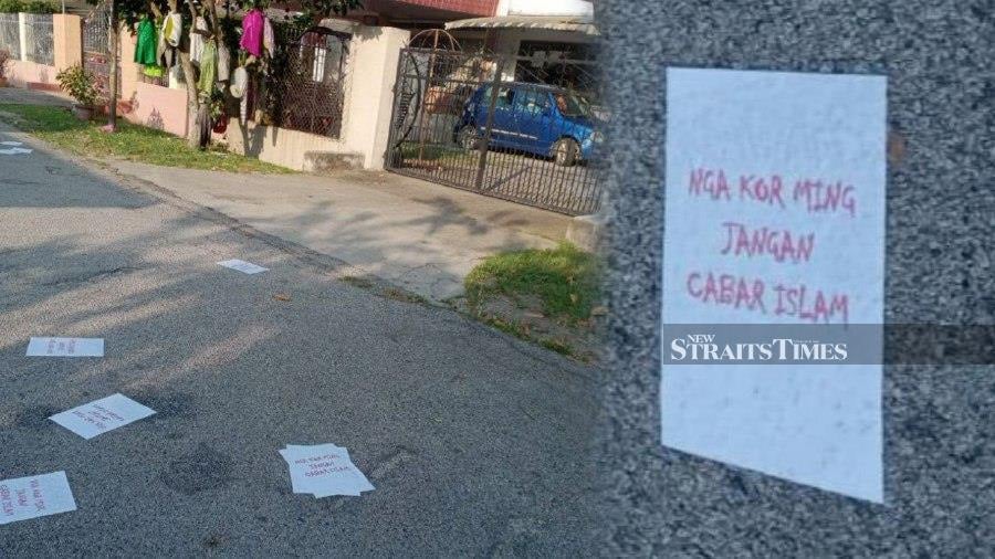  Threatening notes with the words: “Nga Kor Ming, do not challenge Islam” found scattered outside the Housing and Local Government minister’s parents’ home.- NSTP/MUHAMAD LOKMAN KHAIRI.