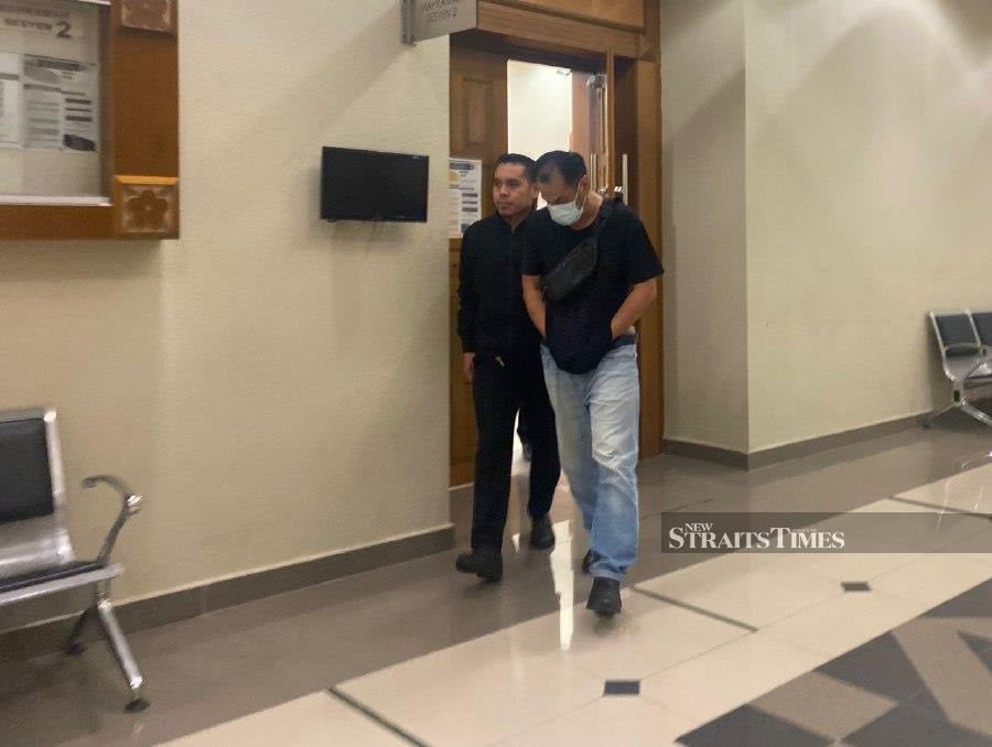 Rohaizi Ismail, 50, pleaded not guilty when the charges were read out by a court interpreter before Judge Mohd Sabri Ismail. - NSTP/Asrol Awang