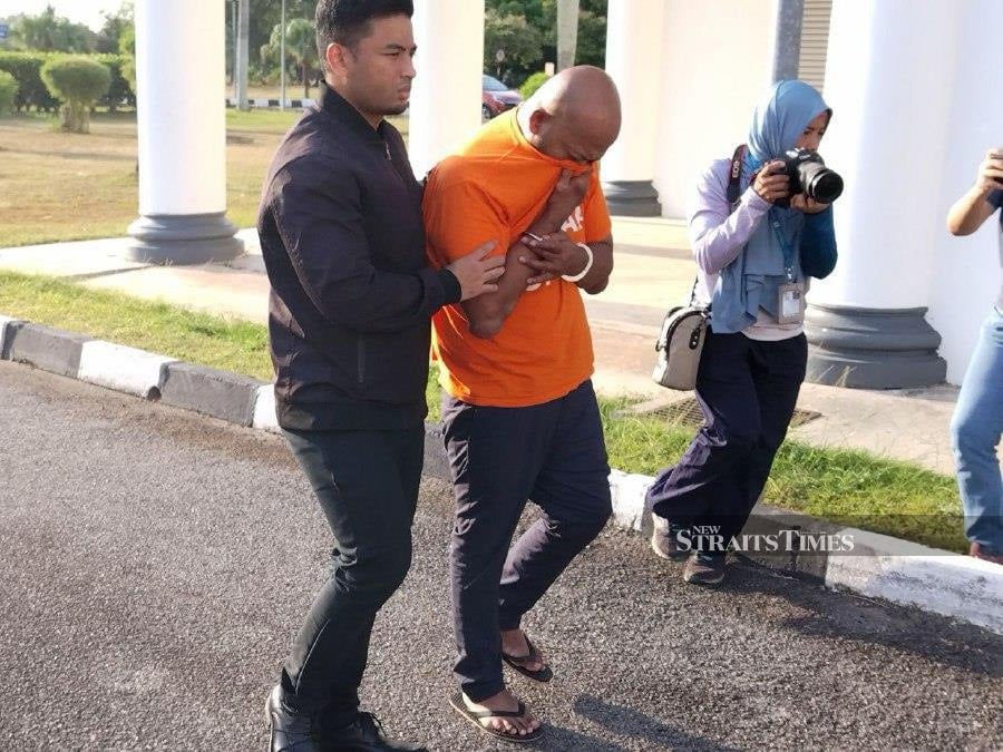 A director of a law enforcement agency, arrested for suspected involvement in a RM1.18 million false claim case for maintenance work on a vessel, has been remanded for a day. - NSTP/Ahmad Mukhsein Mukhtar 