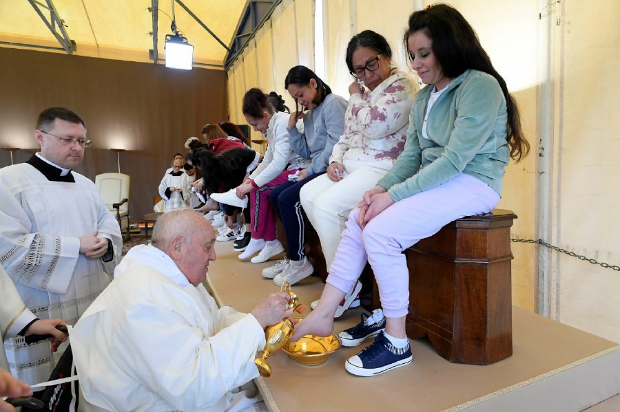 Pope Francis washes the feet of inmates of the female section of Rebibbia Prison during a Holy Thursday ritual, in Rome, Italy March 28, 2024. - REUTERS PIC