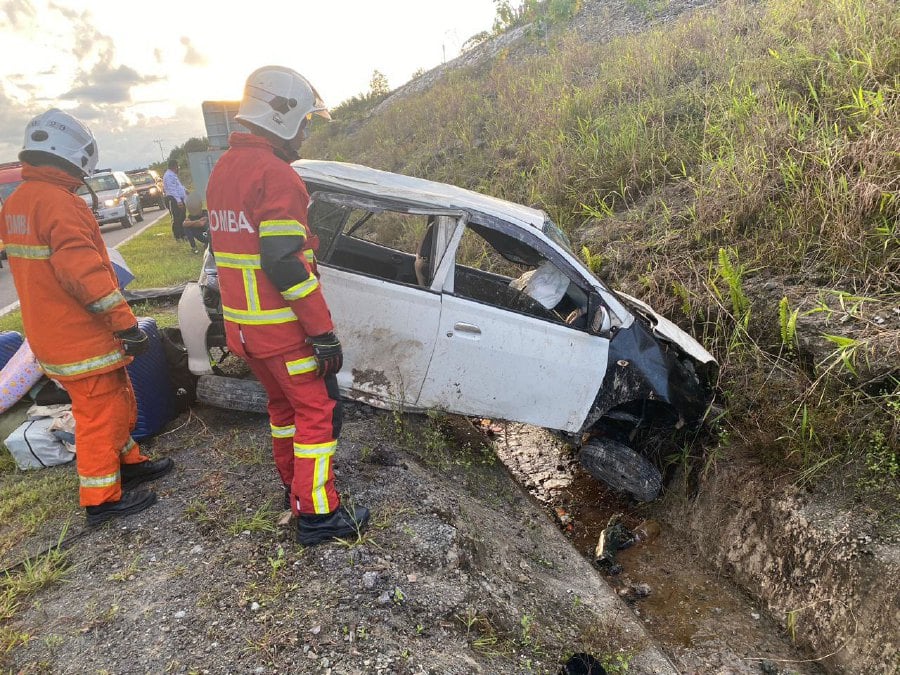 Police said the car went off the road and rolled over “several times” before landing in a small drain. - Pic courtesy JBPM