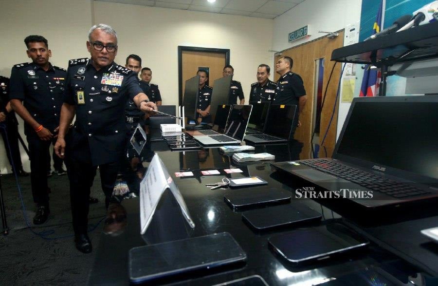 Federal Commercial Crime Investigation Department director Datuk Seri Ramli Mohamed Yoosuf said following intelligence, a raid was conducted on April 10 at a location in Cheras, Kuala Lumpur, believed to be operating a fraudulent call centre activity. - NSTP/HAIRUL ANUAR RAHIM