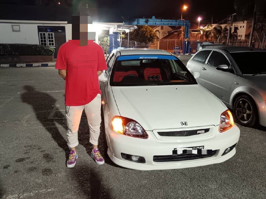 The two men were arrested for driving a car and riding a motorcycle that posed a danger to themselves and other road users. - Pic courtesy of PDRM