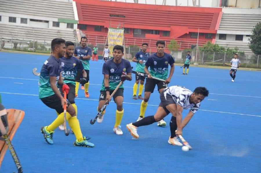 Faizal Saari (in white) in action in the Premier Division of the Bangladesh Hockey League. Courtesy Pic