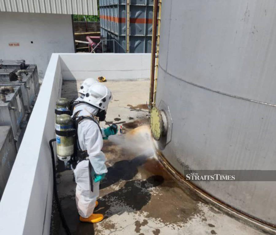 Two men were rendered semi-conscious, while two others felt nauseated, following a chemical leak at a plastic laminate production factory in Lunas today. Pic courtesy of Fire and Rescue Department 