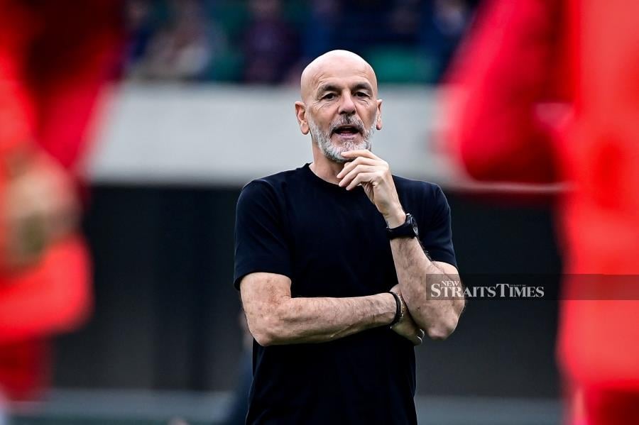 AC Milan coach Stefano Pioli reacts during the Serie A match against Hellas Verona at the Marcantonio Bentegodi Stadium, in Verona on March 17. AFP PIC