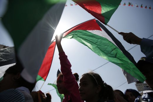 President Abbas raises Palestinian flag for first time at UN | New ...