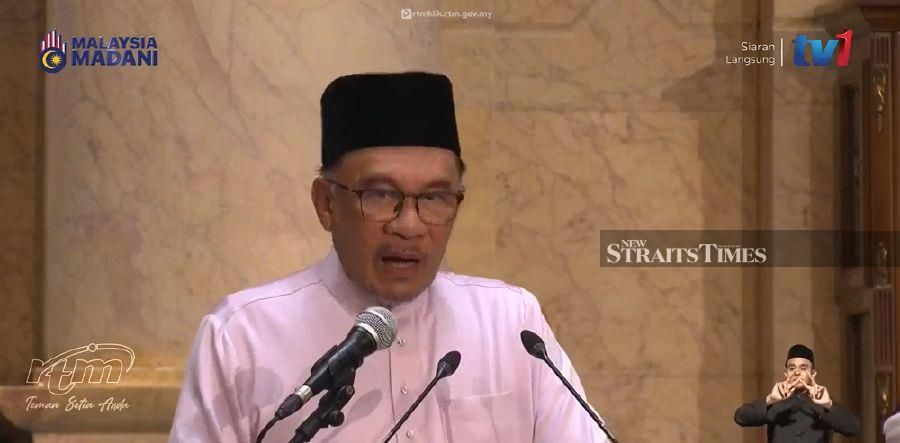 Prime Minister Datuk Seri Anwar Ibrahim  delivers his keynote address at the ‘Majlis Ilmu Madani’ event at the Putra Mosque in Putrajaya.