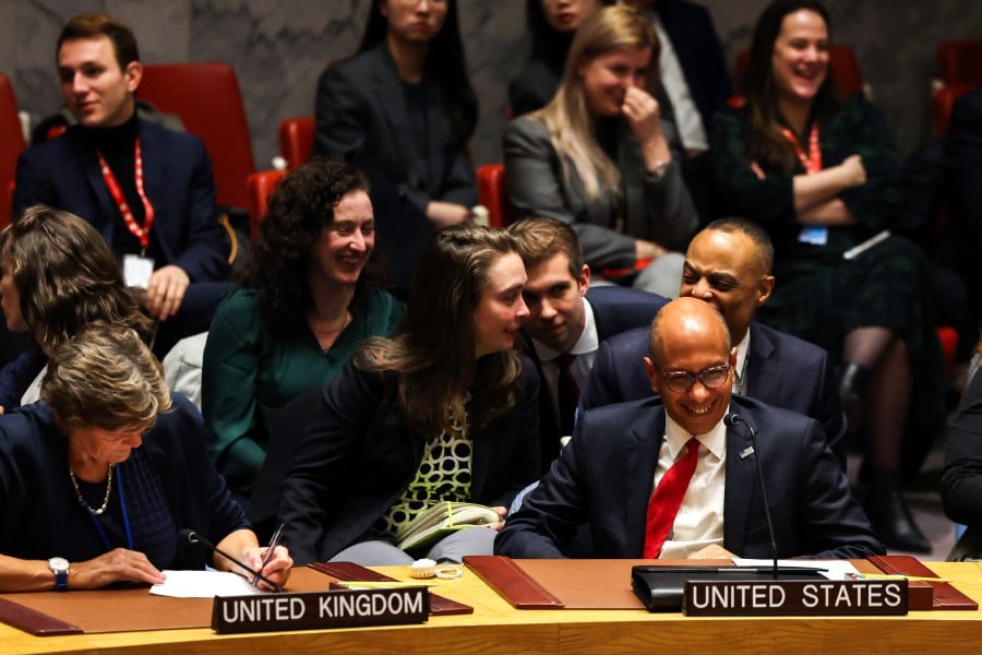 US Deputy Ambassador to the UN Robert Wood (R), flanked by British Ambassador to the UN Barbara Woodward (L), reacts during a United Nations Security Council meeting on a resolution calling for a ceasefire in Gaza at UN headquarters in New York on December 8, 2023. - AFP PIC