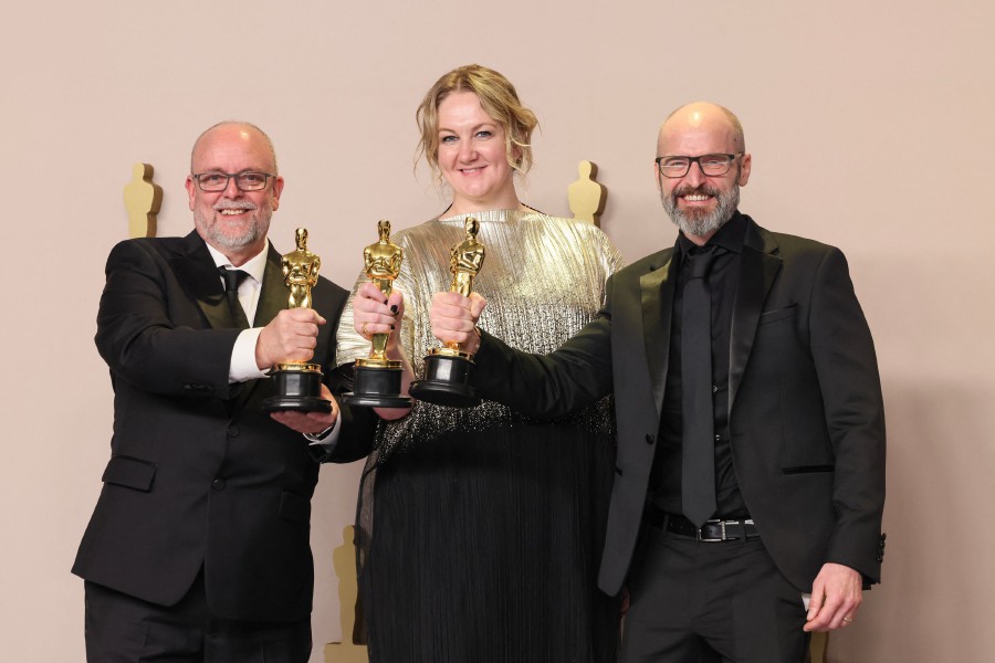  Josh Weston, Nadia Stacey, and Mark Coulier, winners of Makeup and Hairstyling award for 'Poor Things,' pose in the press room during the 96th Annual Academy Awards at Ovation Hollywood in Hollywood, California. -AFP PIC