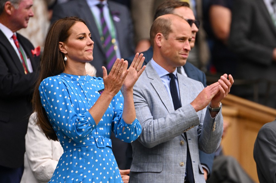 Britain's Catherine, Duchess of Cambridge (L) and Britain's Prince William, Duke of Cambridge, applaud in the Royal Box at the Centre court during the men's singles quarter final tennis match between Serbia's Novak Djokovic and Italy's Jannik Sinner on the ninth day of the 2022 Wimbledon Championships at The All England Tennis Club in Wimbledon0. - AFP PIC