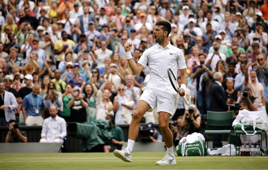 Novak Djokovic of Serbia celebrates winning the men's quarter final match against Jannik Sinner of Italy at the Wimbledon Championships, in Wimbledon. -EPA PIC