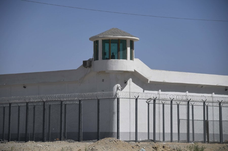 A watchtower this spring at a high-security facility near what is believed to be a re-education camp on the outskirts of Hotan, in the Xinjiang region of China. Pic courtesy of New York Times /CreditCreditGreg Baker/Agence France-Presse — Getty Images
