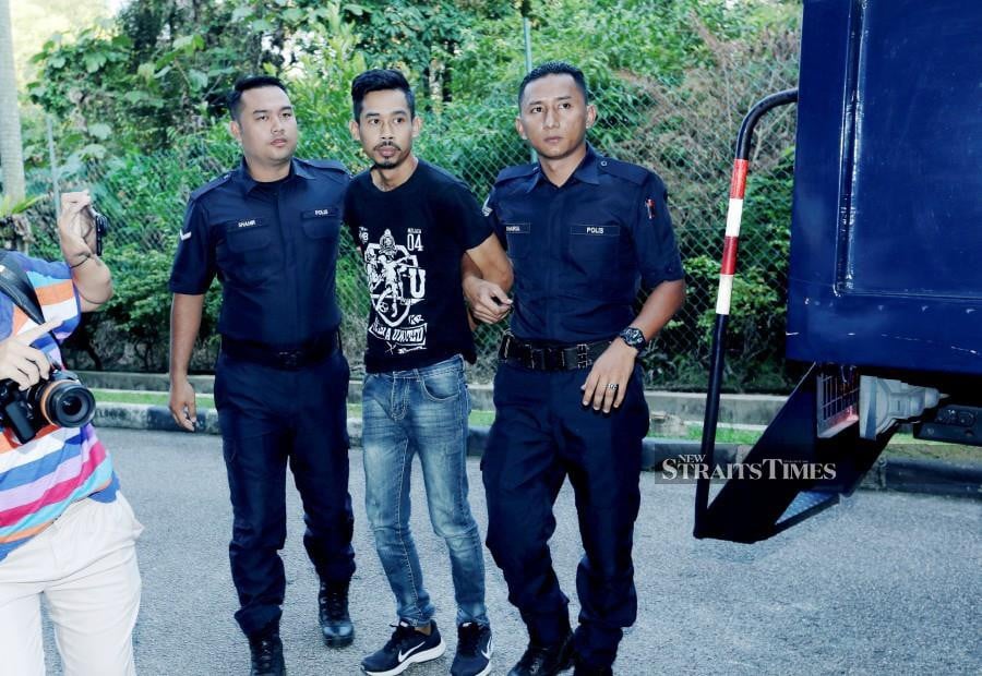 Shahrul Nizam Zuraimy, who was clad in a black t-shirt and a pair of jeans, appeared calm when he was produced before magistrate Muhammad Nazrin Ali Rahim. (NSTP/KHAIRUNISAH LOKMAN)