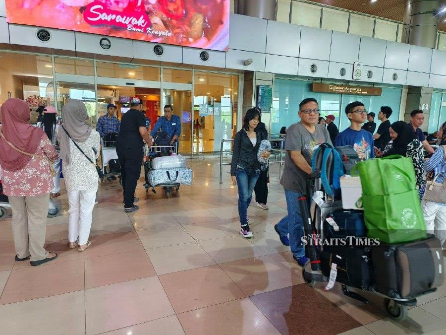 With just a few days remaining until Hari Raya Aidilfitri, it is expected that some 10,000 passengers will arrive daily at Kuching International Airport.- NSTP/Mohd Roji Kawi 