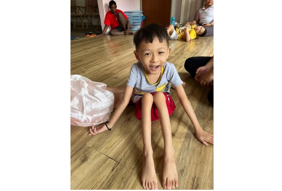 A five-year-old boy named Milo, who was diagnosed with cerebral palsy making him unable to stand nor walk, requires aid to sustain his medical needs and education amounting to RM45,000. - Pic courtesy of Malaysian Association for The Welfare of Mentally Challenged Children (IQ70Plus).