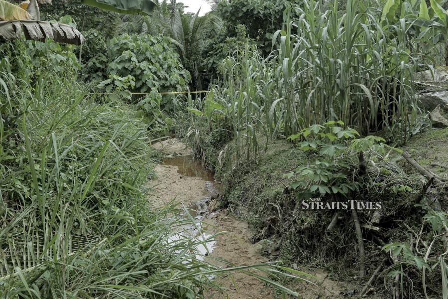 A general view of the creek near the Idaman Apartment, where the remains of the child was found. -NSTP/SADIQ SANI