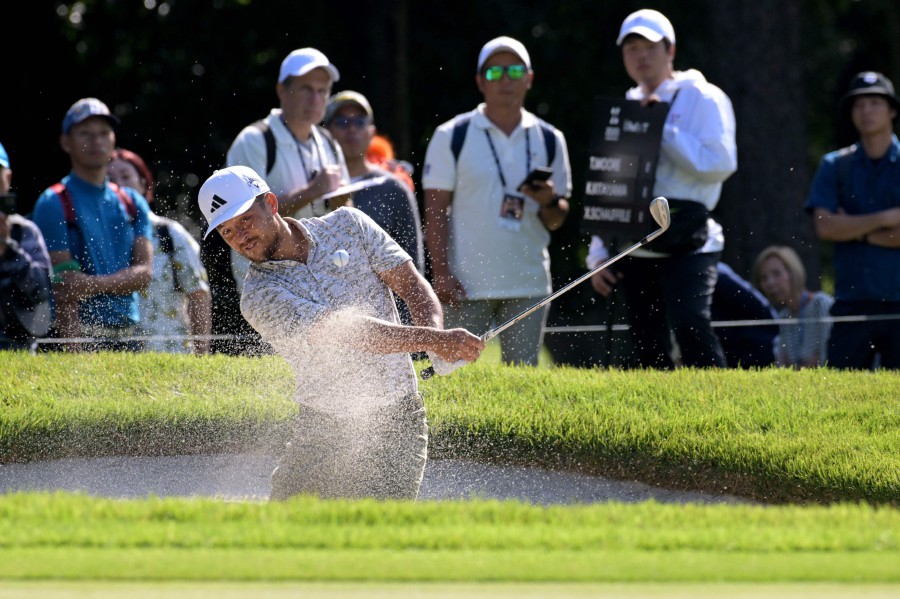 Xander Schauffele of the US hits a shot on the 11th hole during the first round of PGA Zozo Championships golf tournament at the Narashino Country Club in Inzai, Chiba prefecture. - AFP PIC