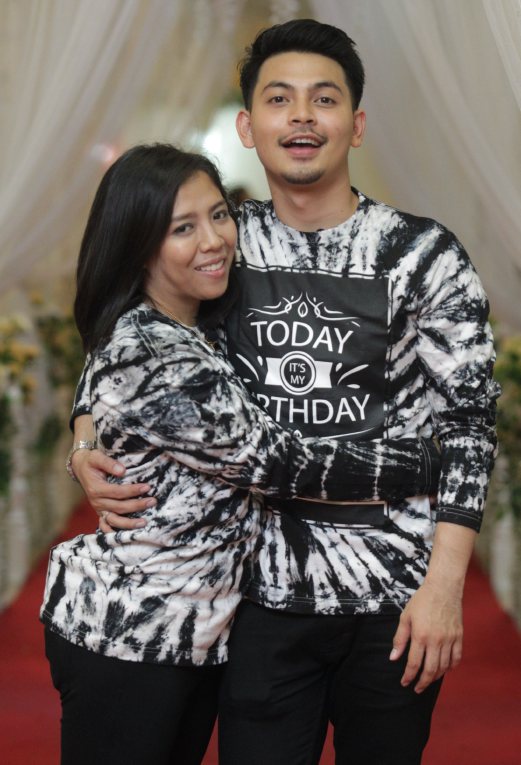 Izzue Islam and Awin Nurin at his birthday celebration earlier this month in Shah Alam. Pix by Aziah Azmee