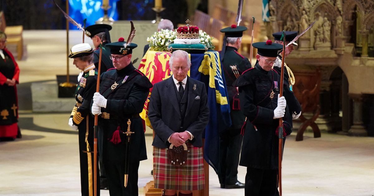 Royals stage vigil as mourners stream by queen's coffin