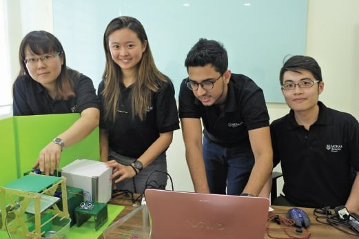 (From left) Kathrynn Tan, Alison Tan, Karam Puri and Victor Ong Zheiquan from Team Ecosolutions. 