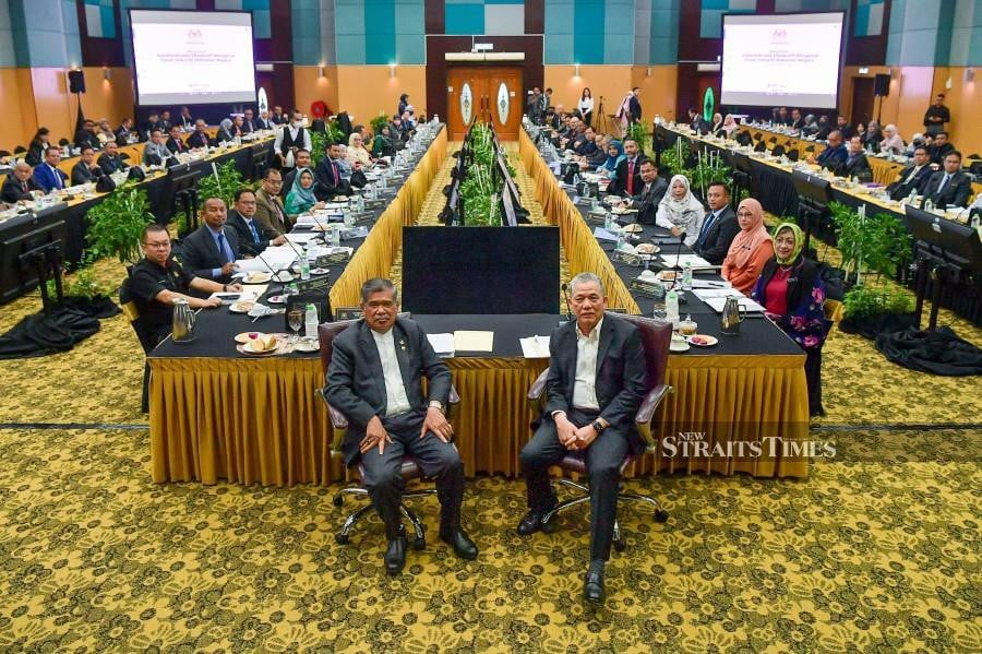 Deputy Prime Minister Datuk Seri Fadillah Yusof and Agriculture and Food Security Minister Datuk Seri Mohamad Sabu pose for a photo ahead of the 2023 National Food Security Policy’s Executive Committee meeting in Kuala Lumpur. - BERNAMA PIC