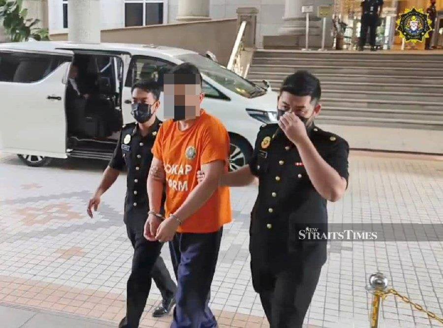 The accused is seen arriving at the court ahead of his hearing. - Pic courtesy of MACC