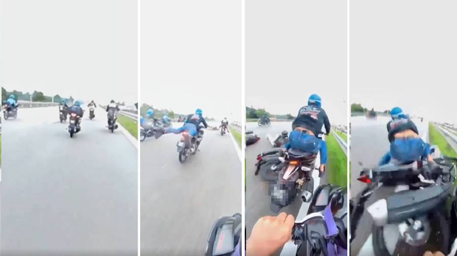 The 28-second video clip shows the group of motorcyclists, competing with each other while performing a 'superman' stunt before one of them loses control and falls.- Pic credit readers