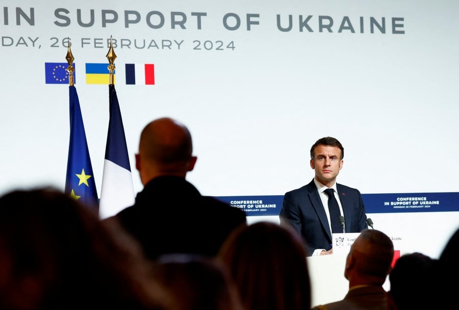 French President Emmanuel Macron speaks during a press conference at the end of the conference in support of Ukraine, with European leaders and government representatives, at the Elysee Palace in Paris, France. - REUTERS PIC