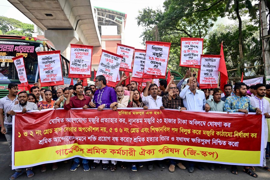 Garment workers and activists protest in Dhaka on November 10, 2023. - AFP PIC