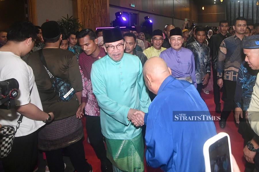 Prime Minister Datuk Seri Anwar Ibrahim arrives for the Madani Hari Raya Aidilfitri celebration at the Sabah International Convention Centre in Kota Kinabalu. - NSTP/MOHD ADAM ARININ