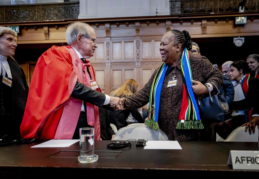 South African professor of International Law John Dugard and South African Minister of International Relations and Cooperation Naledi Pandor (R) arrive at the International Court of Justice (ICJ) prior to the verdict announcement in the genocide case against Israel, brought by South Africa, in The Hague. - AFP PIC
