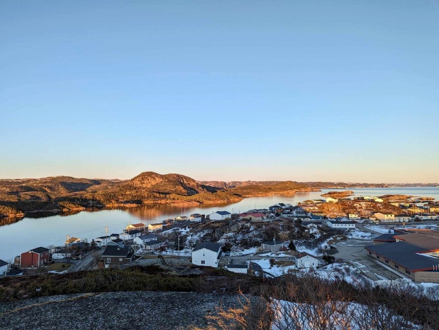 A view from the top of Maiden Tea Hill overlooks the seaside town of Burgeo, with the small Eclipse Island, named by Royal Navy explorer Captain James Cook in 1766, at top right in Newfoundland, Canada. - REUTERS PIC