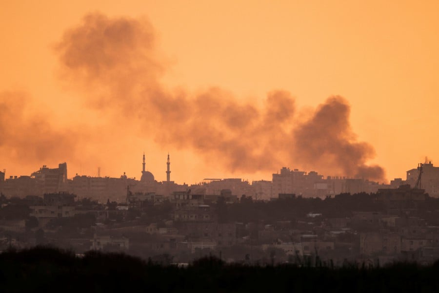 Smoke rises above southern Gaza, amid the ongoing conflict in Gaza between Israel and Hamas, as seen from Israel's border with Gaza in southern Israel. - REUTERS PIC