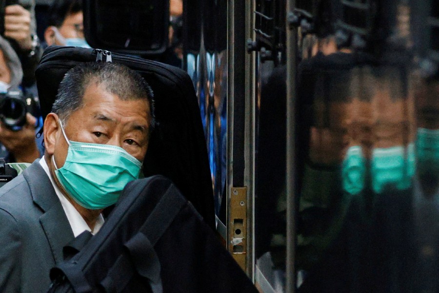 (FILE PHOTO) Media tycoon Jimmy Lai, founder of Apple Daily, looks on as he leaves the Court of Final Appeal by prison van, in Hong Kong, China. (REUTERS/Tyrone Siu/File Photo)
