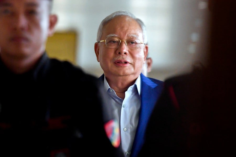 Datuk Seri Najib Razak seen arriving at the Kula Lumpur Courts Complex ahead of his trial. - BERNAMA PIC
